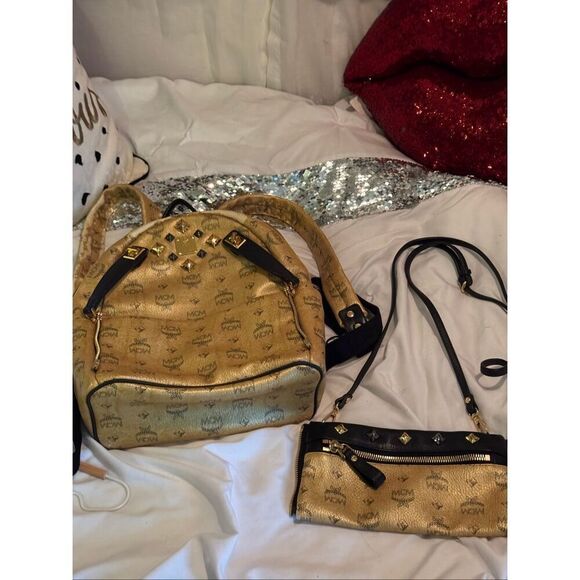 MCM Visetos Dual Stark Backpack convertible crossbody bag studded gold black main image 4